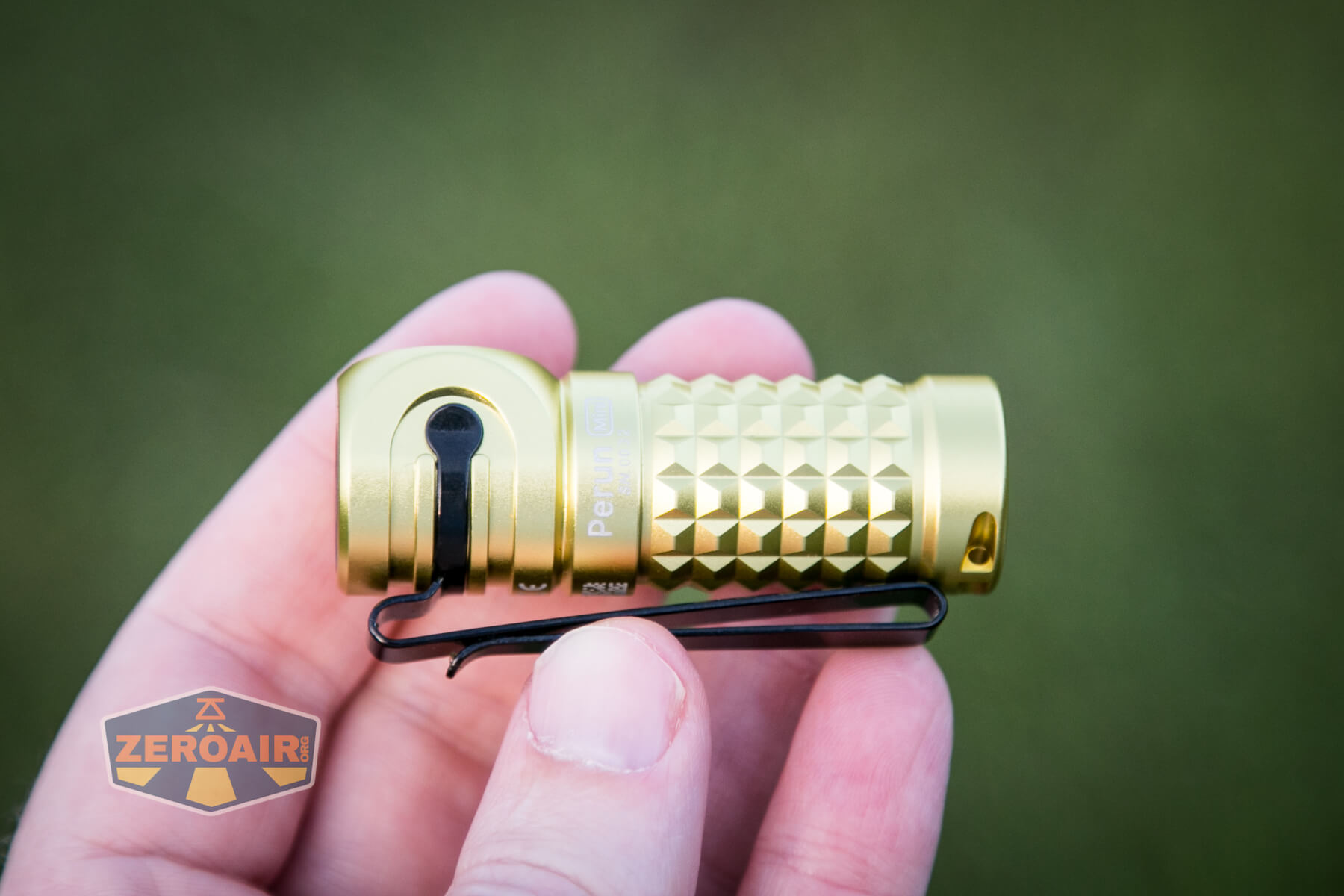 Olight Perun Mini Kit Headlight in hand