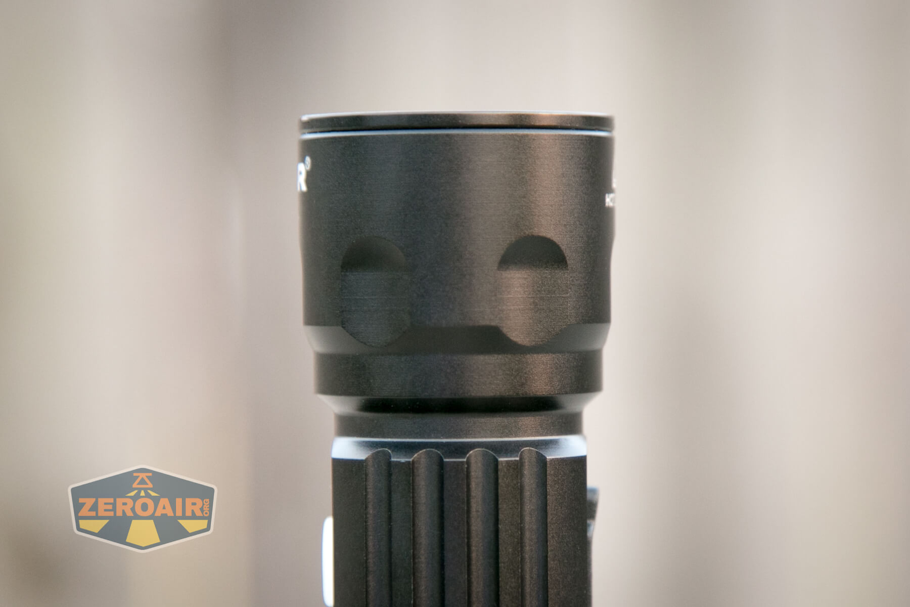 XTAR R30 1200 Flashlight bezel