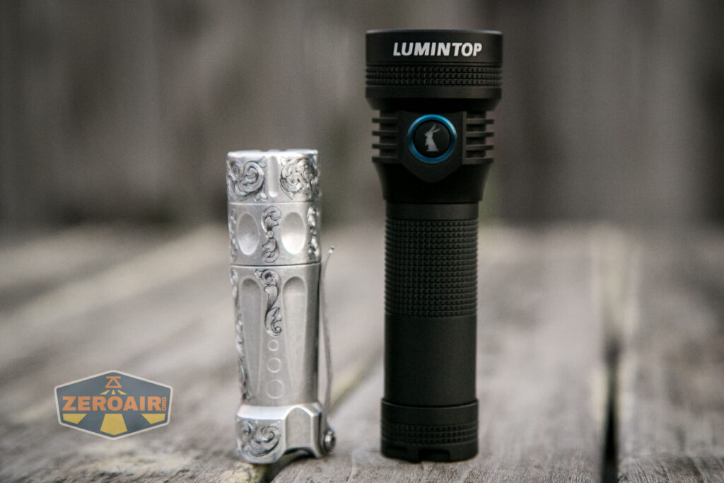 Lumintop D2 thrower flashlight beside torchlab boss 35