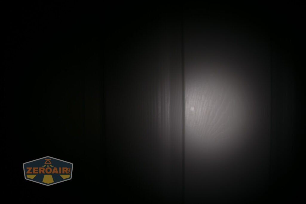 Lumintop FWAA TiCU 14500 flashlight beamshots on door compared to nichia 219b