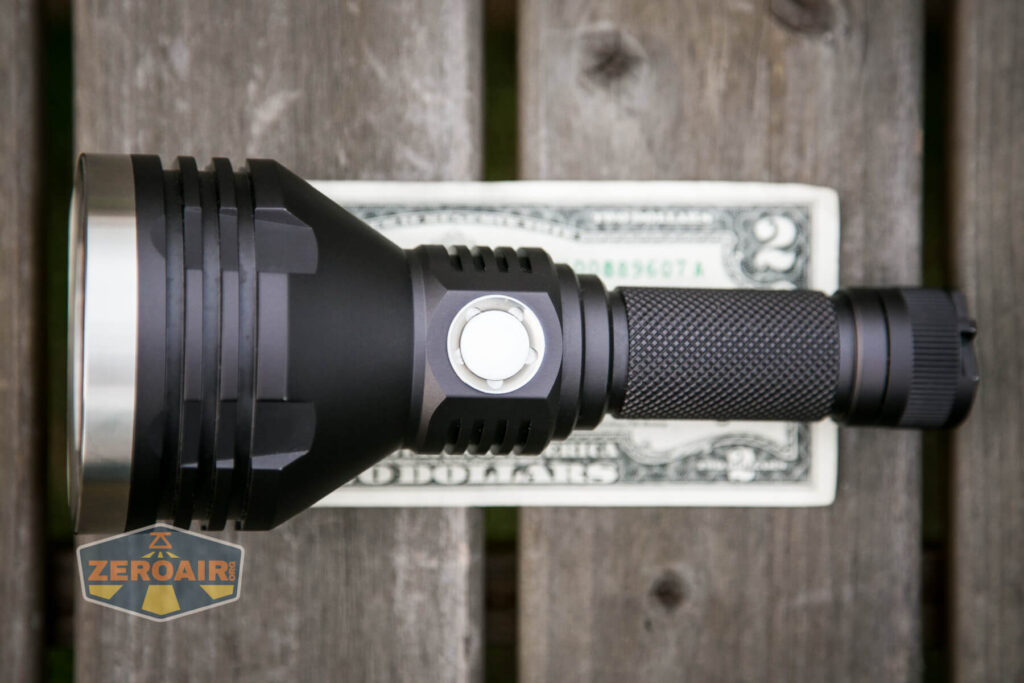 Noctigon K1 21700 Flashlight on two dollar bill