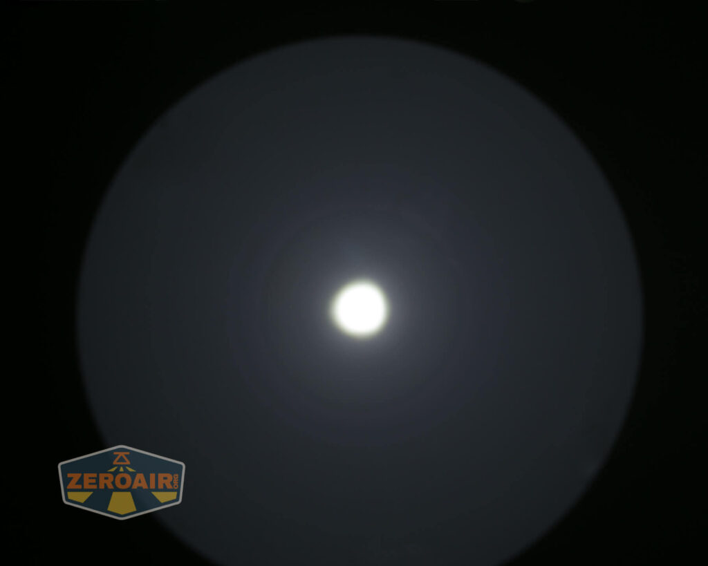 Noctigon K1 21700 Flashlight beamshot on ceiling