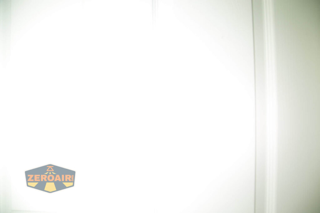 WWLZ Bamboo Small 18350 flashlight beamshots on door compared to nichia 219b white modes