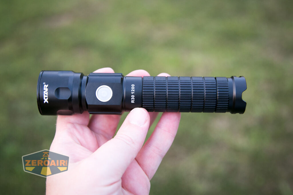 XTAR R30 1200 Flashlight in hand