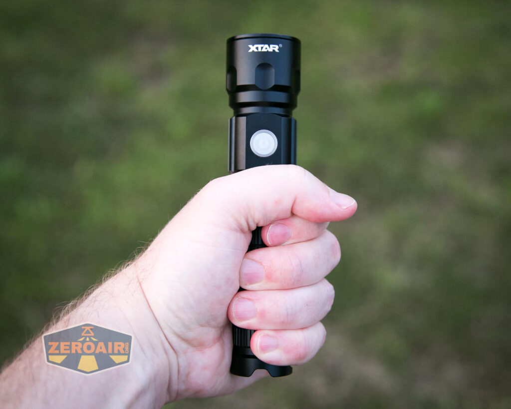 XTAR R30 1200 Flashlight in hand