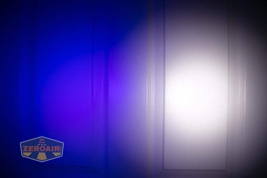 Armytek Wizard C2 WUV Headlamp beamshot on door compared to nichia 219b