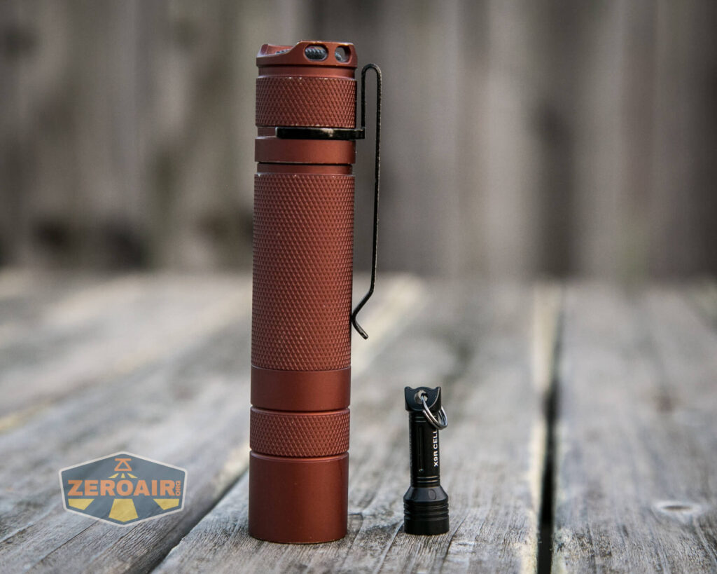 Olight X9R Cell beside convoy s2+