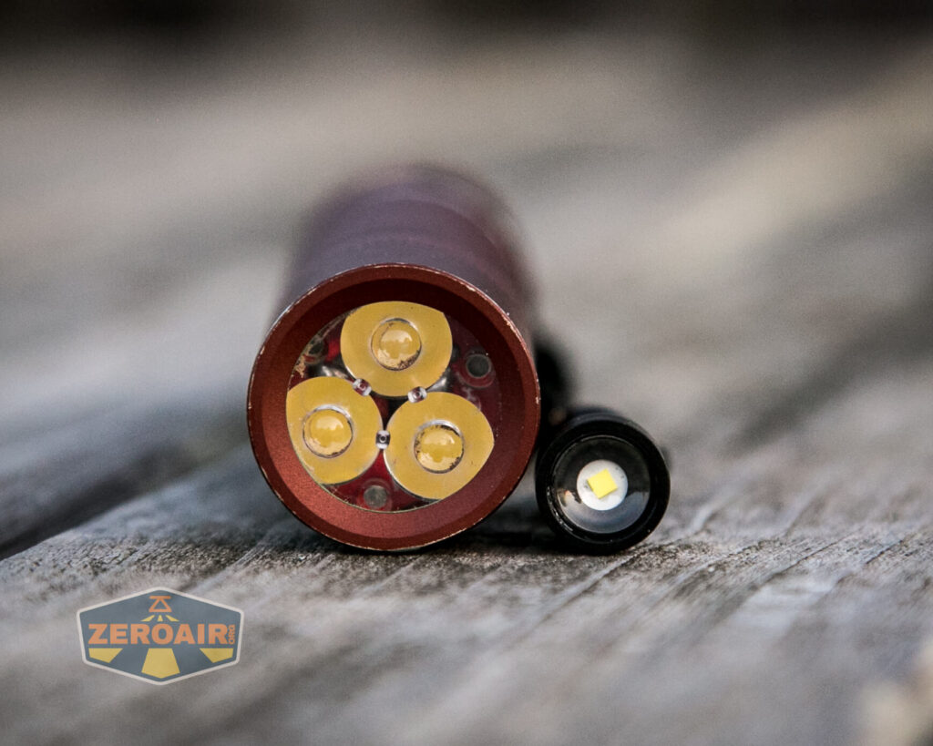 Olight X9R Cell beside convoy s2+