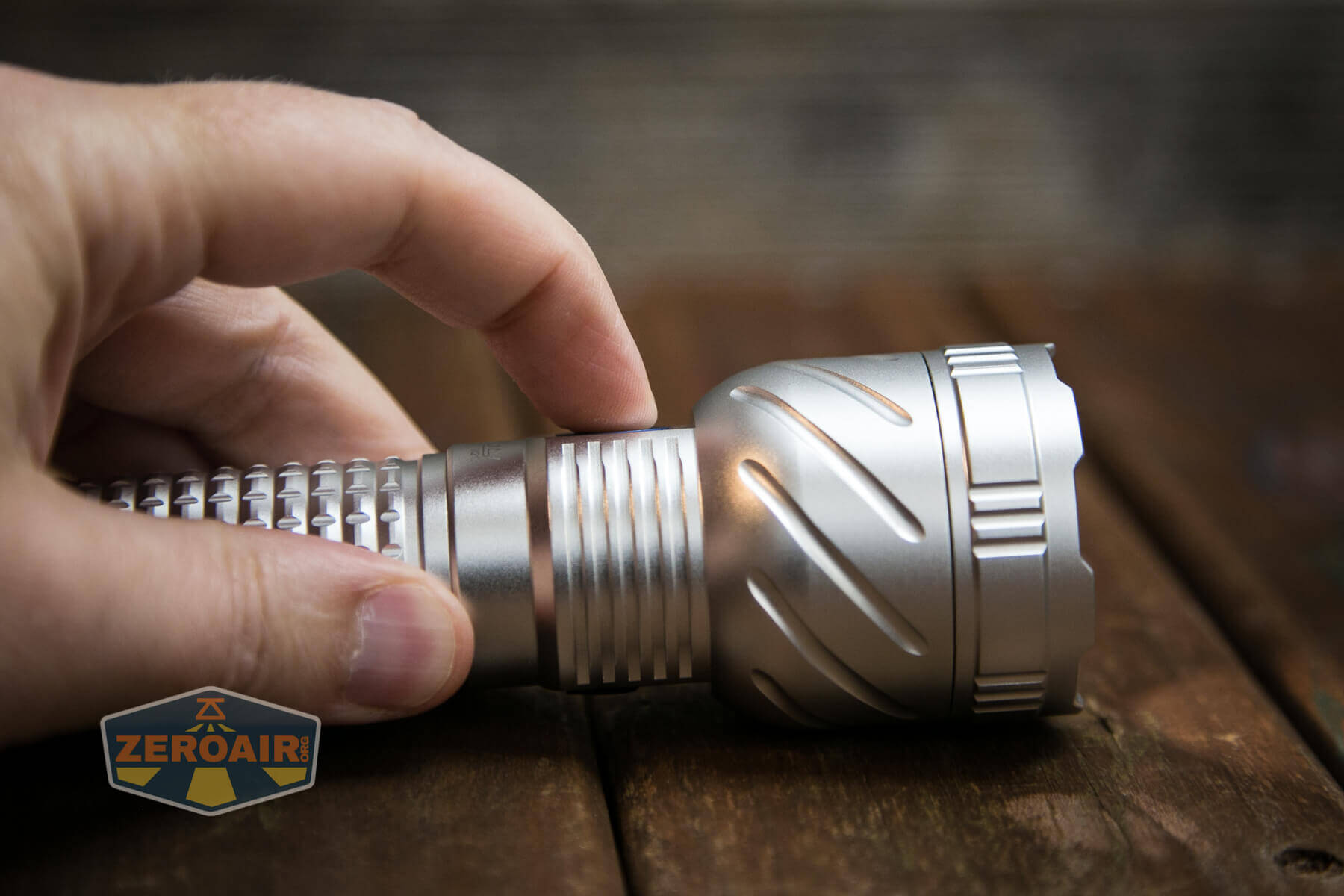Convoy M21E flashlight switch actuation