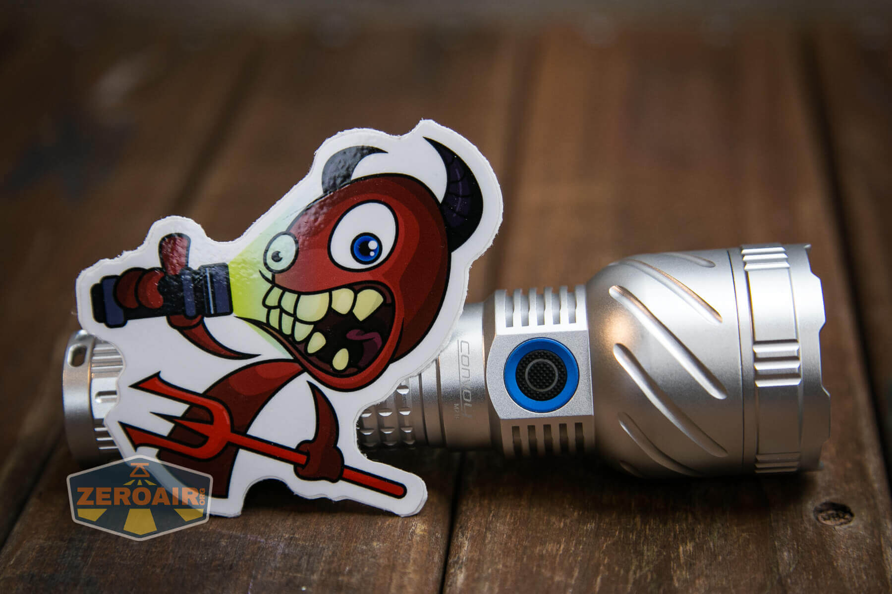 Convoy M21E Flashlight with photonphreaks.com sticker
