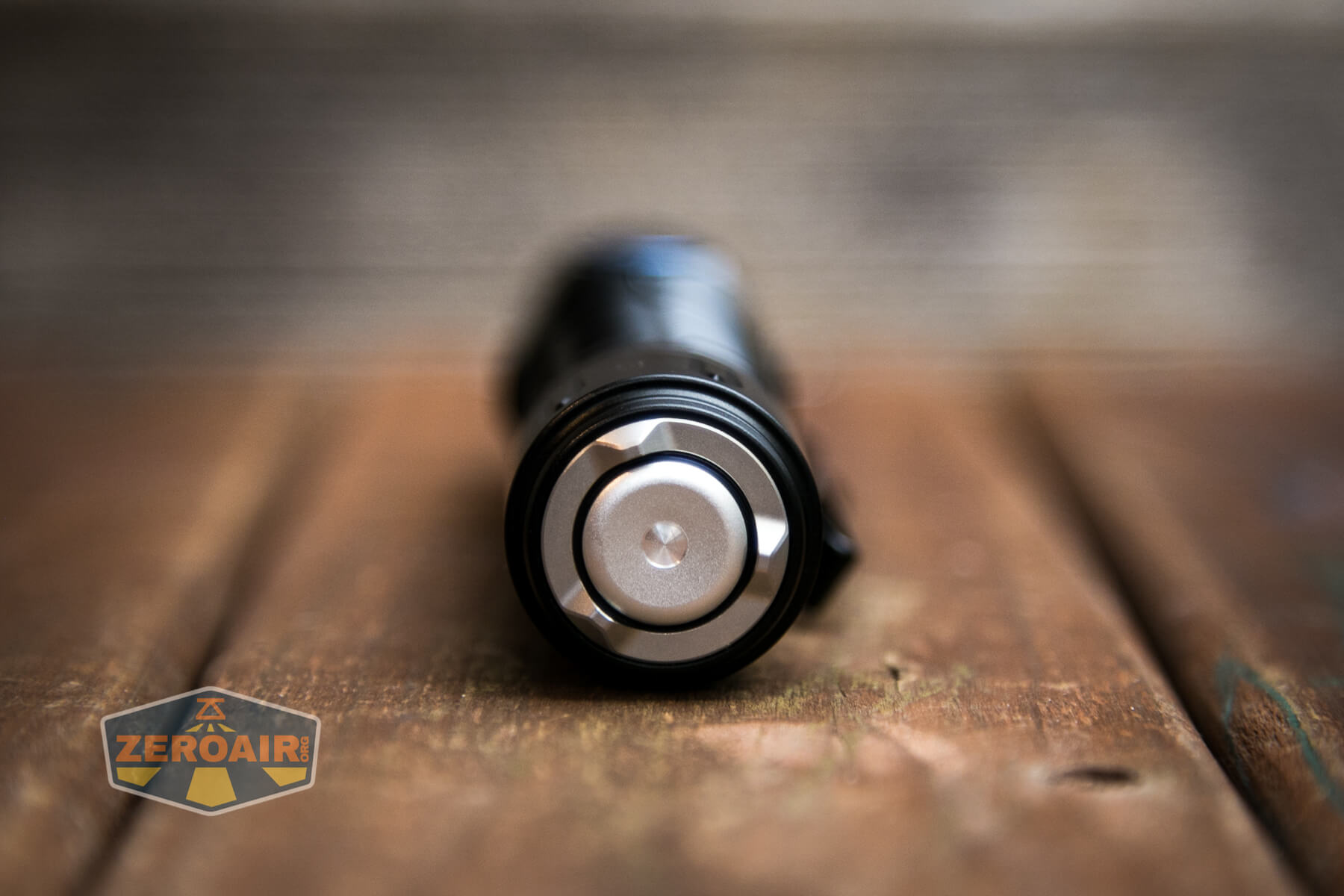 Olight Warrior 3 flashlight tailcap