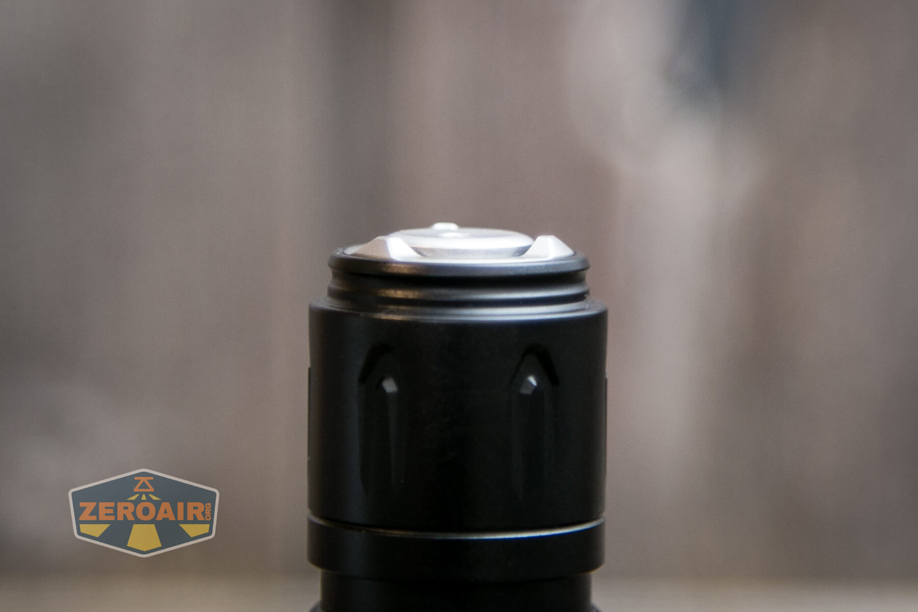 Olight Warrior 3 flashlight tailcap profile