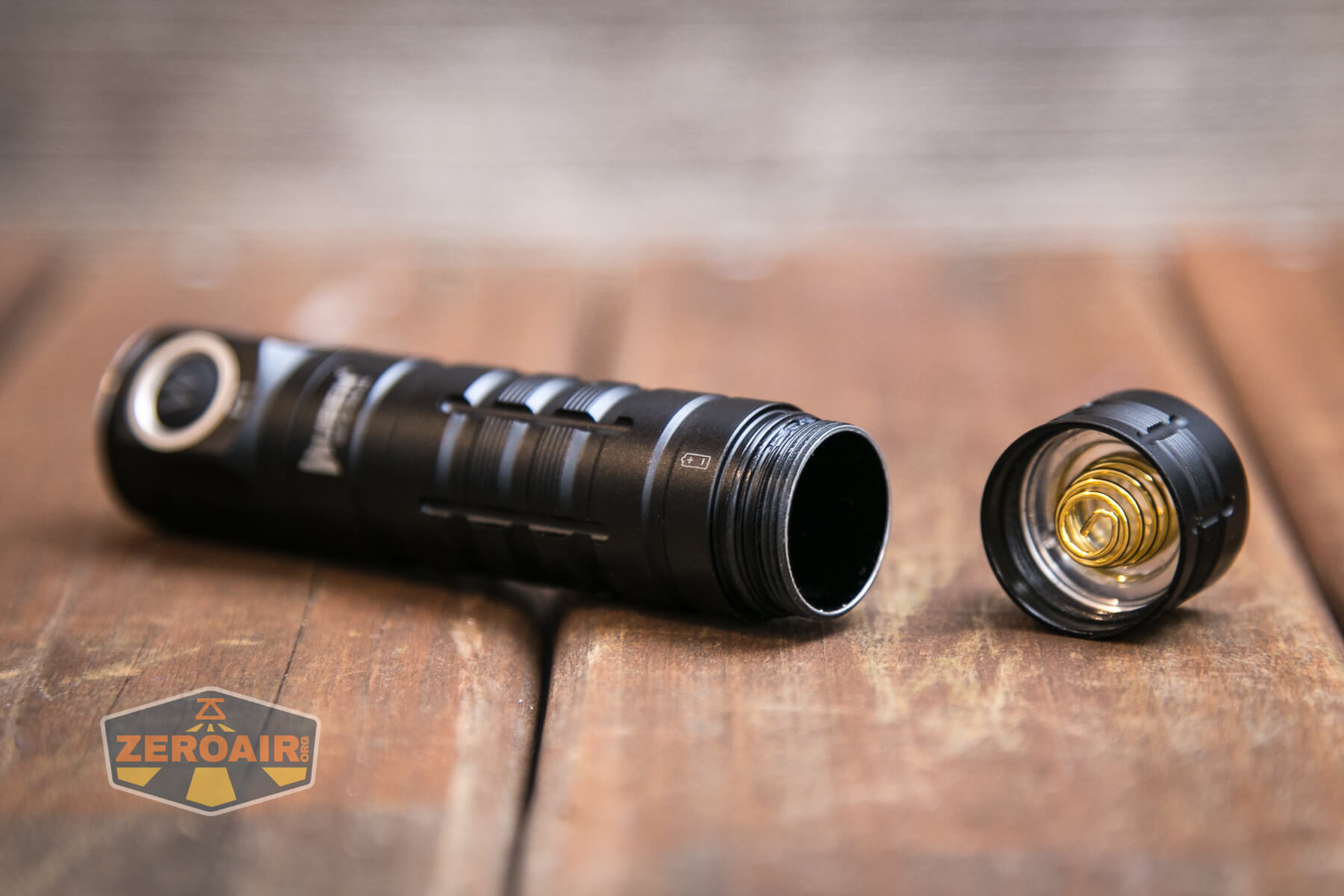 Wuben D1 Flashlight showing tailcap spring