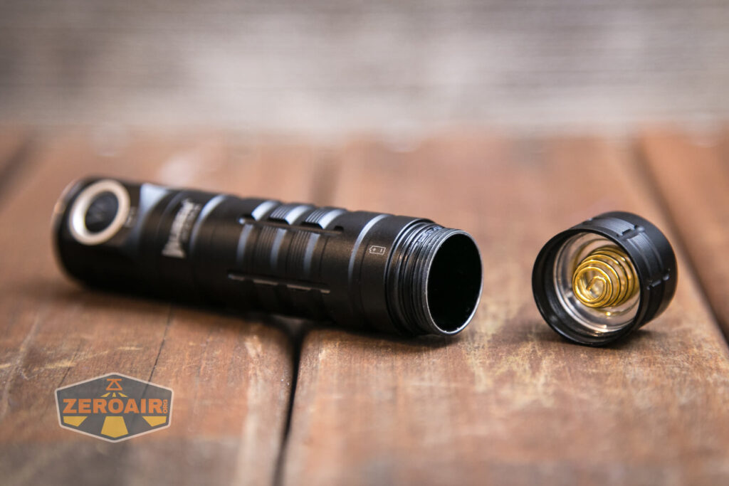 Wuben D1 Flashlight showing tailcap spring