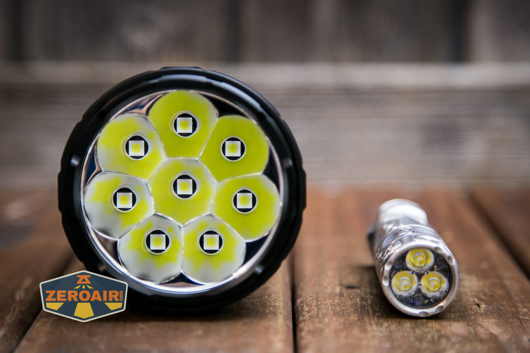 Imalent RS50 flashlight beside torchlab boss 35