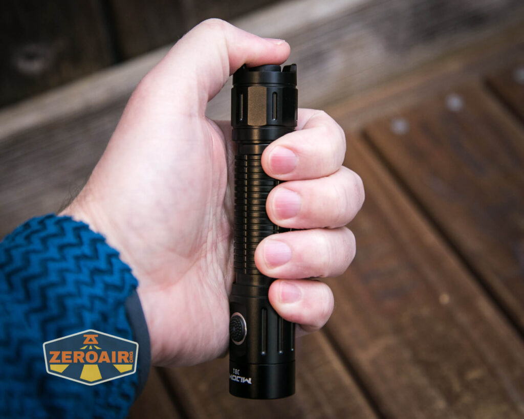 Mijomi J81 flashlight in hand