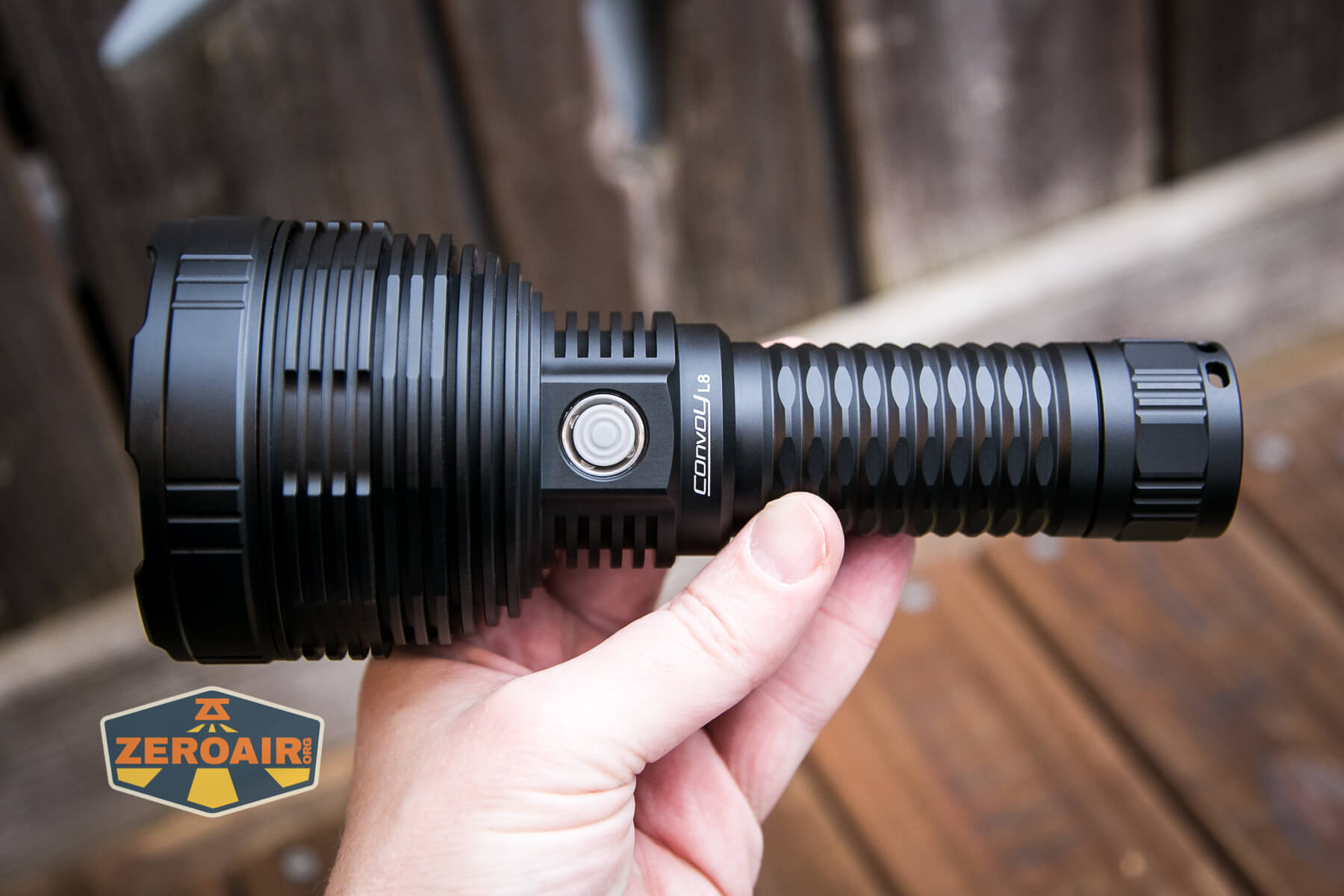 Convoy L8 flashlight in hand