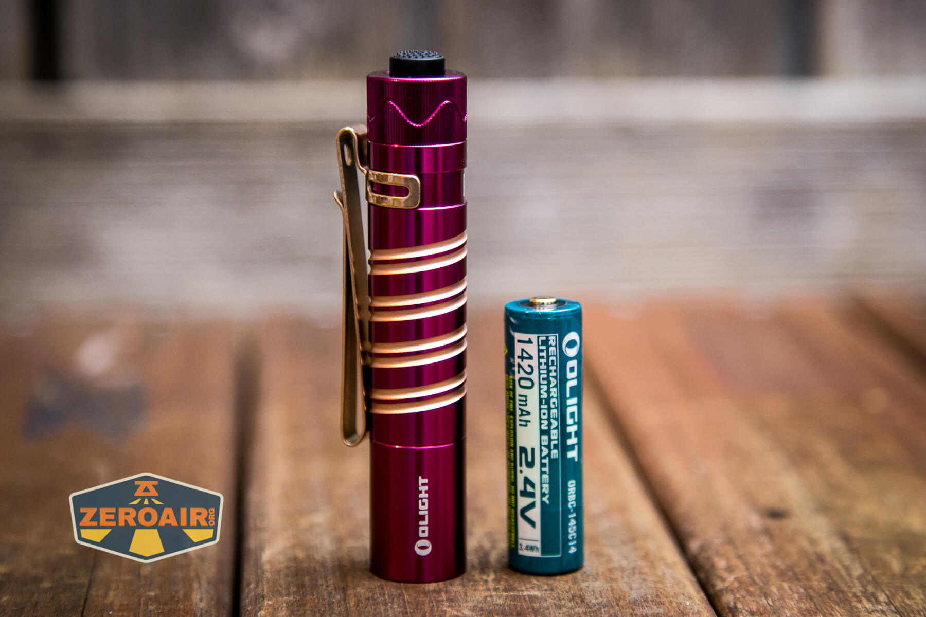 Olight i5R EOS Plum flashlight with "14500" cell