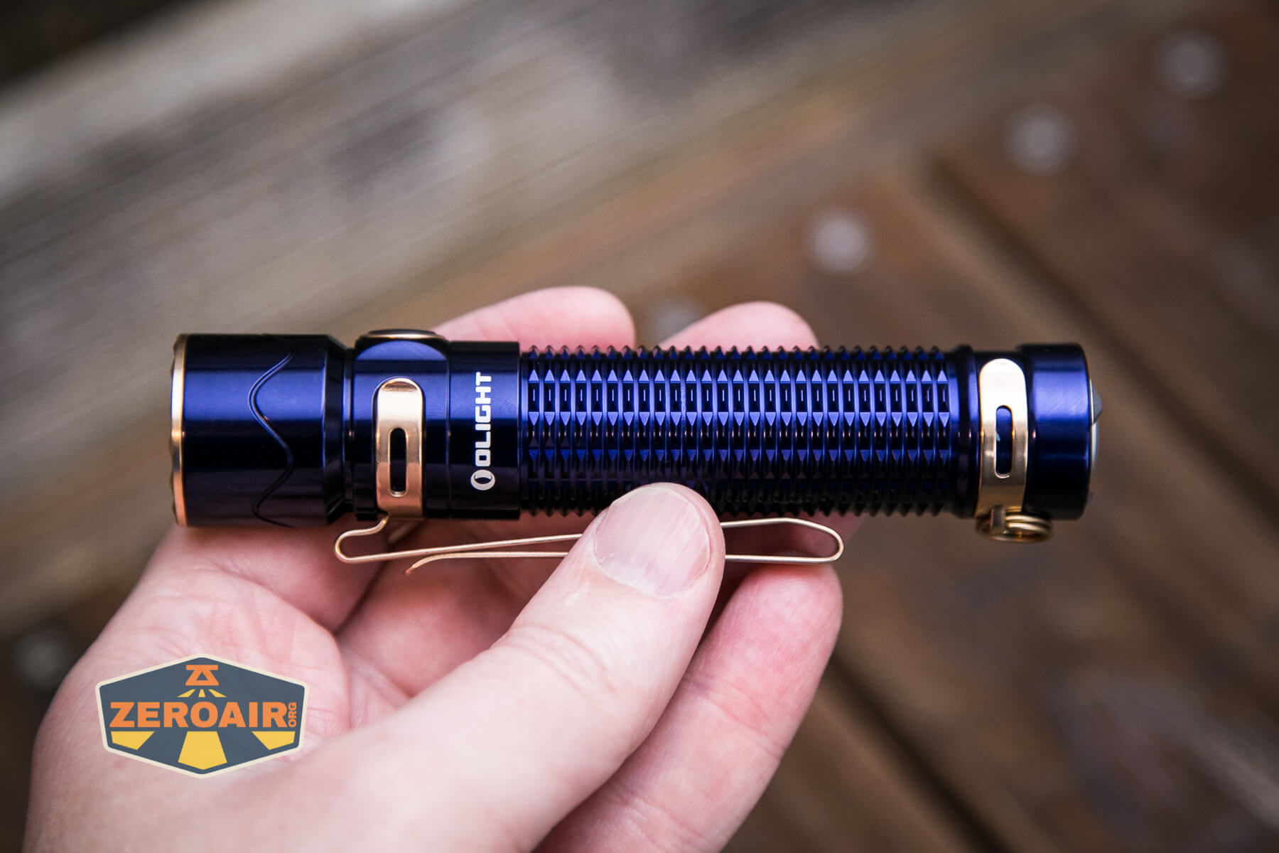 Olight Warrior Mini 2 Regal Blue in hand