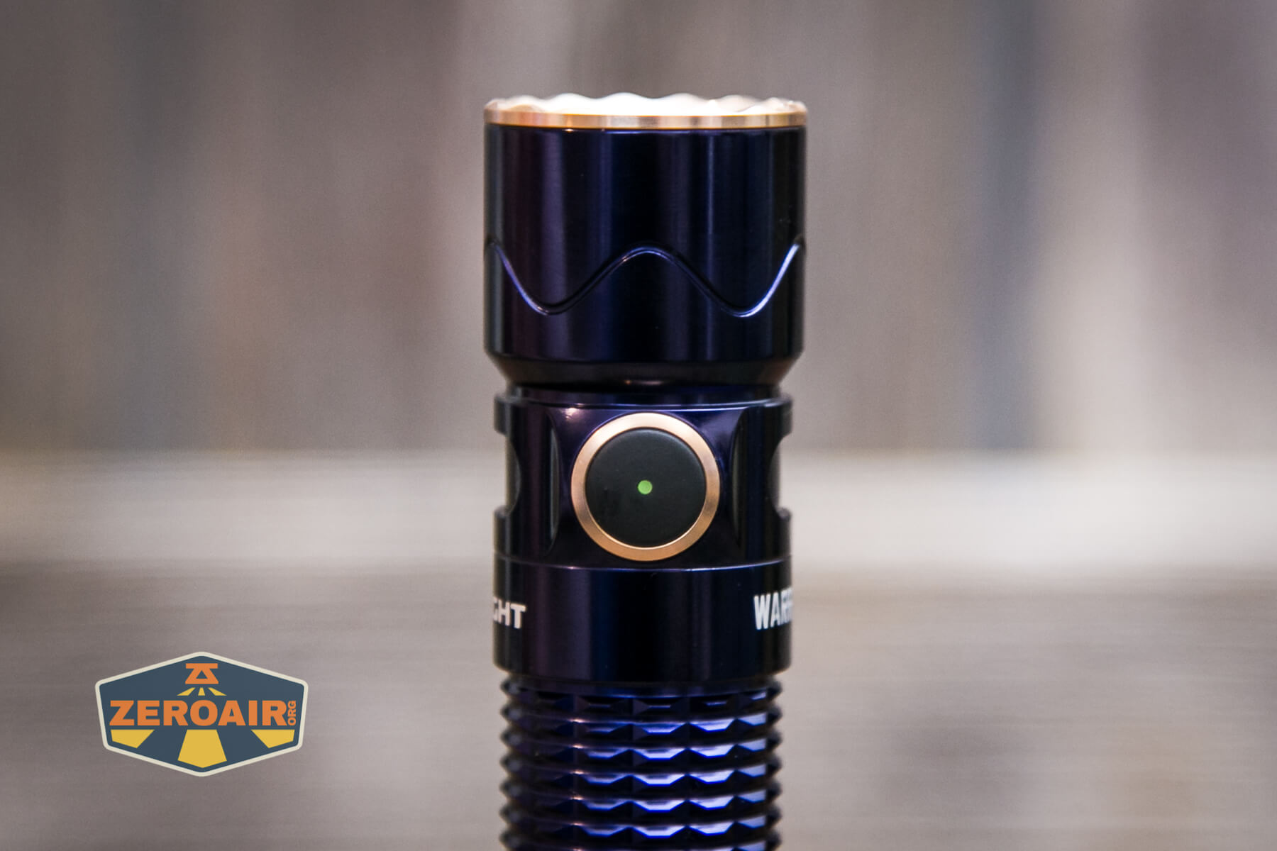 Olight Warrior Mini 2 Regal Blue e-switch indicating green