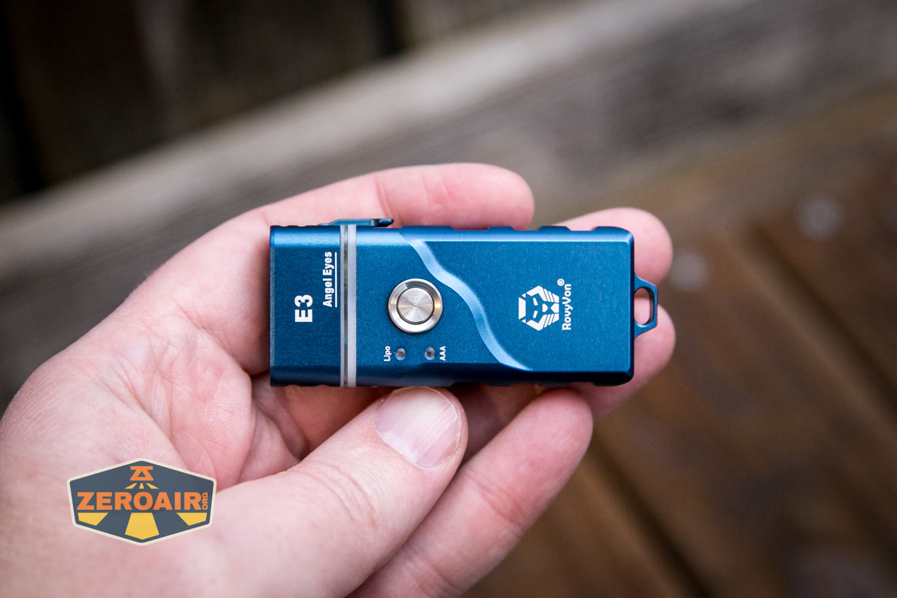 RovyVon Angel Eyes E3 flashlight in hand