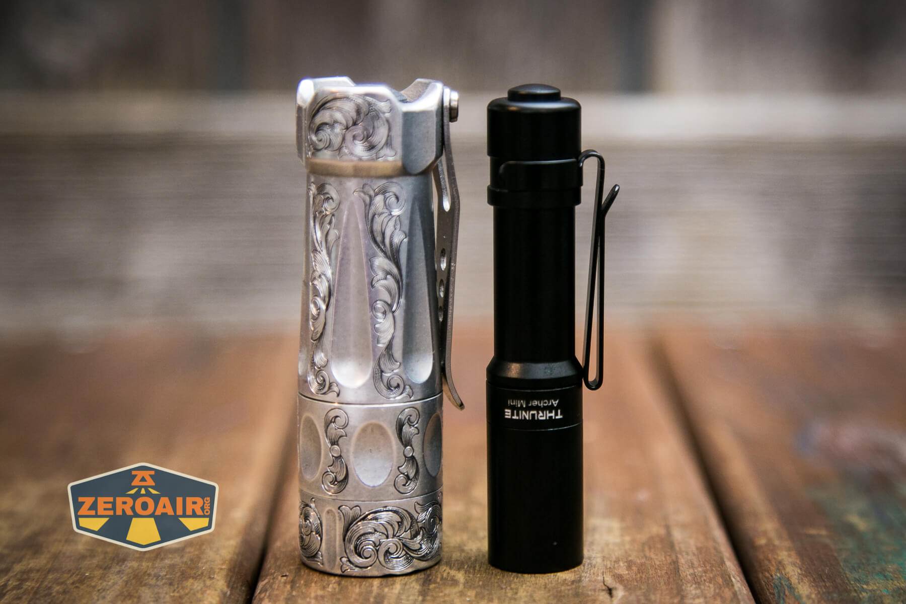 Thrunite Archer Mini flashlight beside the TorchLAB BOSS 35 (custom-engraved)