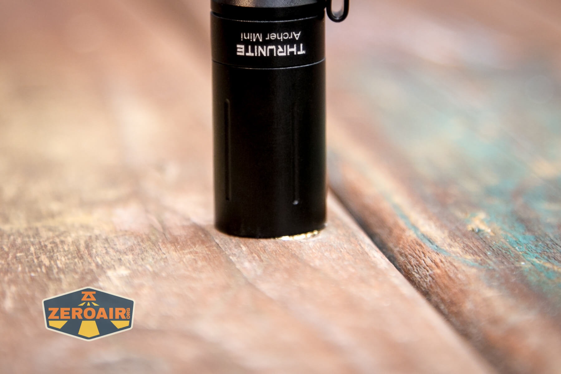 Thrunite Archer Mini flashlight headstanding