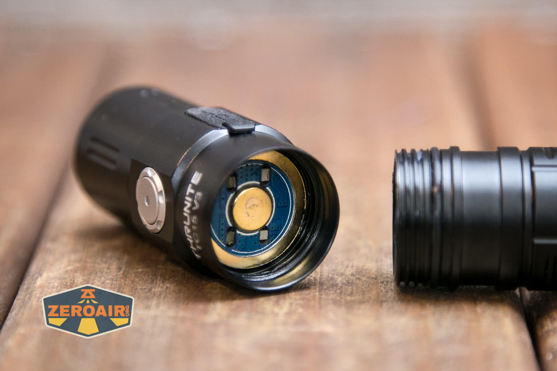 Thrunite TC15 V3 flashlight head contact button