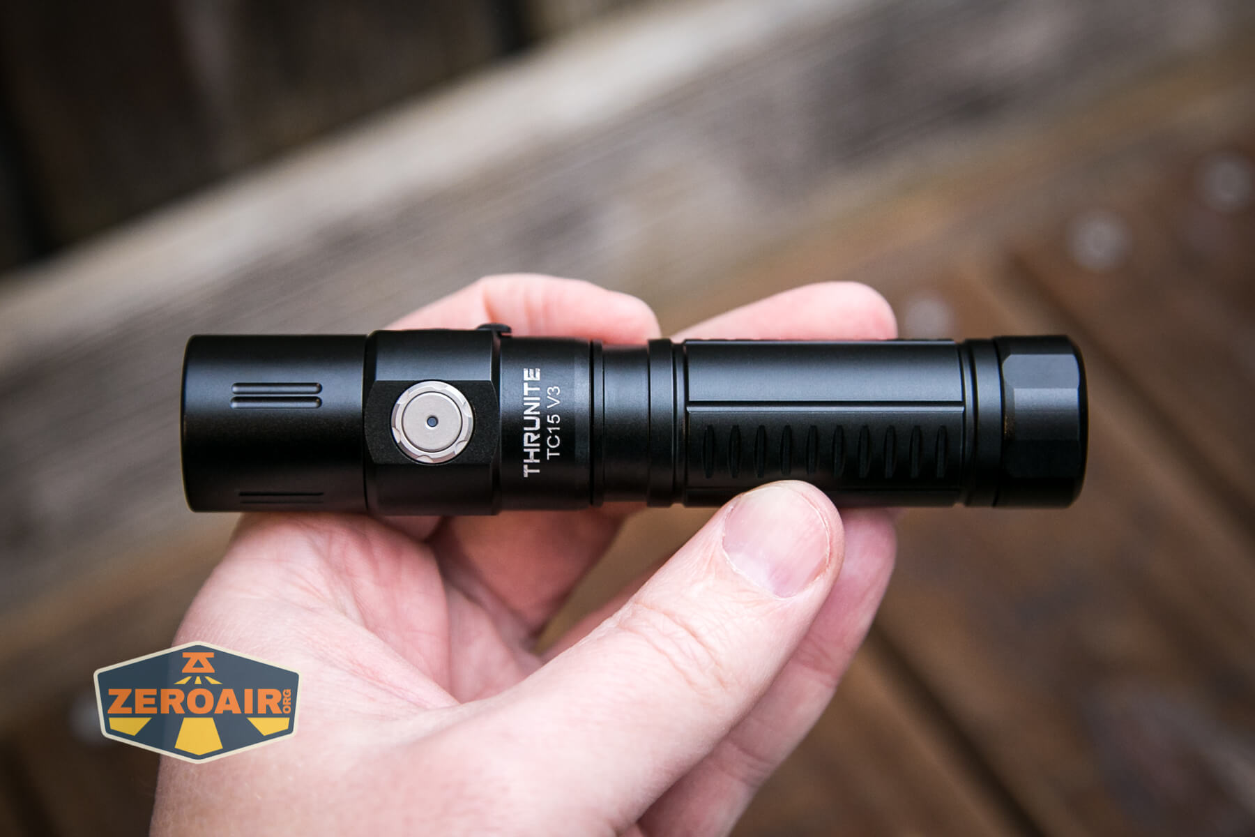 Thrunite TC15 V3 flashlight in hand