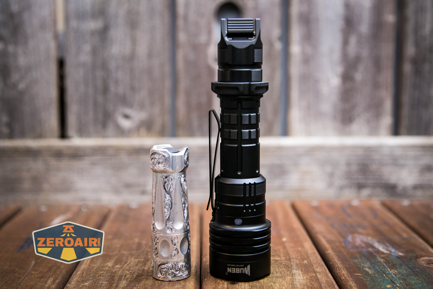 Wuben T1 Tactical flashlight beside torchlab boss 35