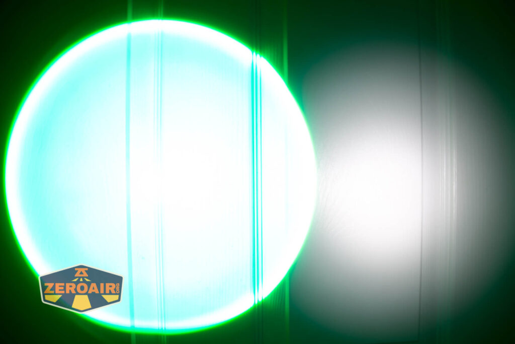 Brinyte HL28 Artemis headlamp beamshots on door compared to nichia 219b green flood