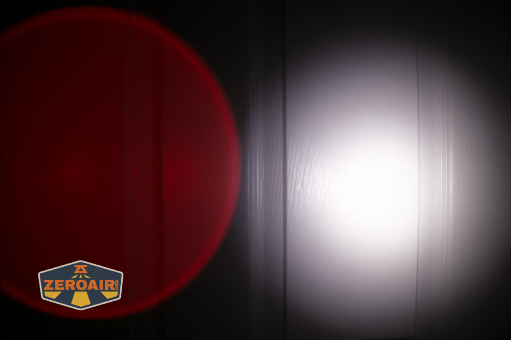 Brinyte HL28 Artemis headlamp beamshots on door compared to nichia 219b red flood