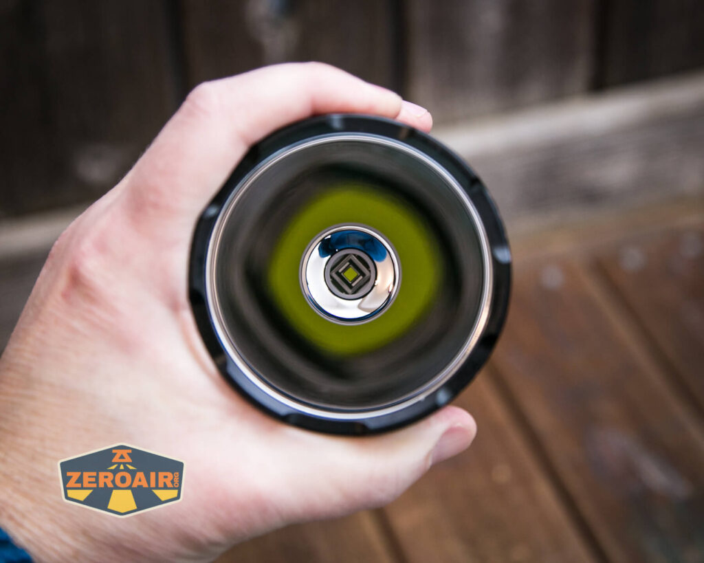 Convoy L8 flashlight in hand