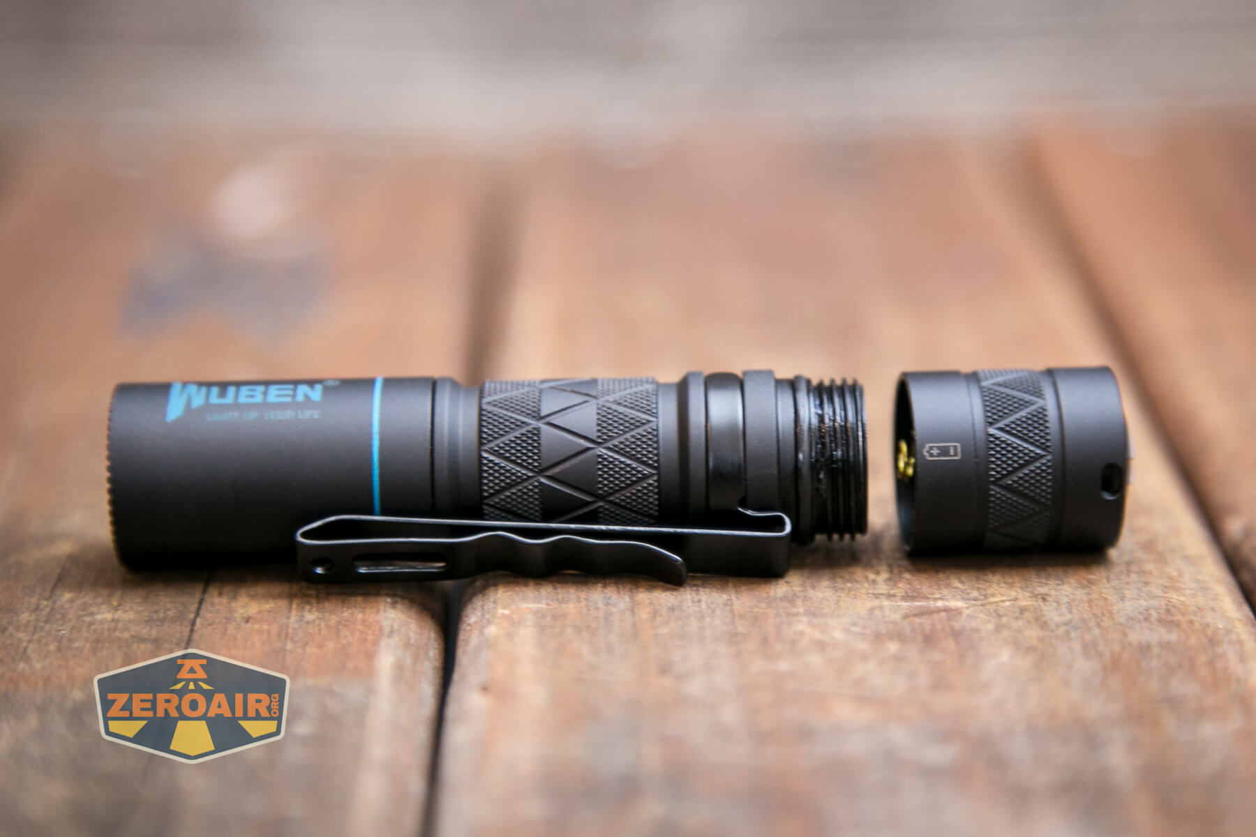 Wuben E18 flashlight tailcap off showing threads