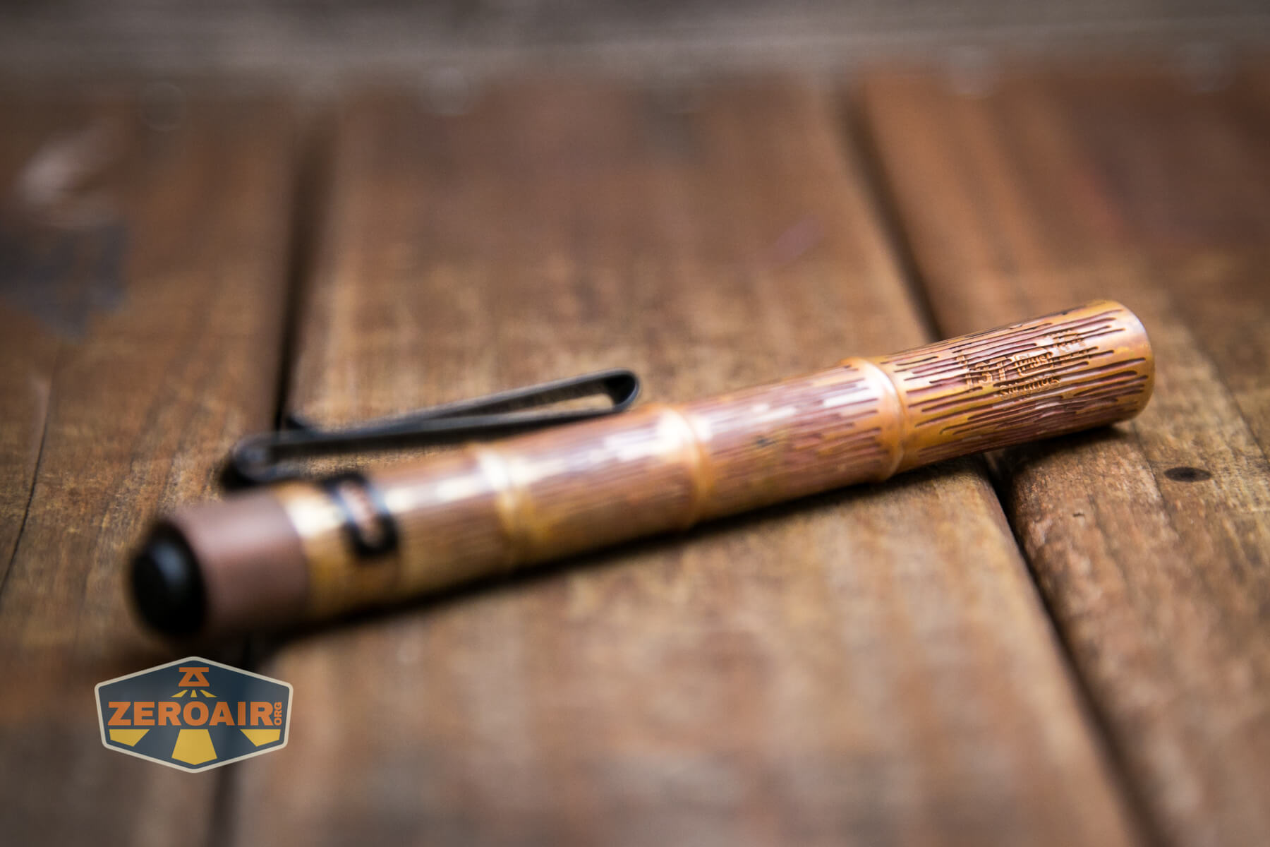 Olight i3T Plus Ancient Bamboo flashlight side view