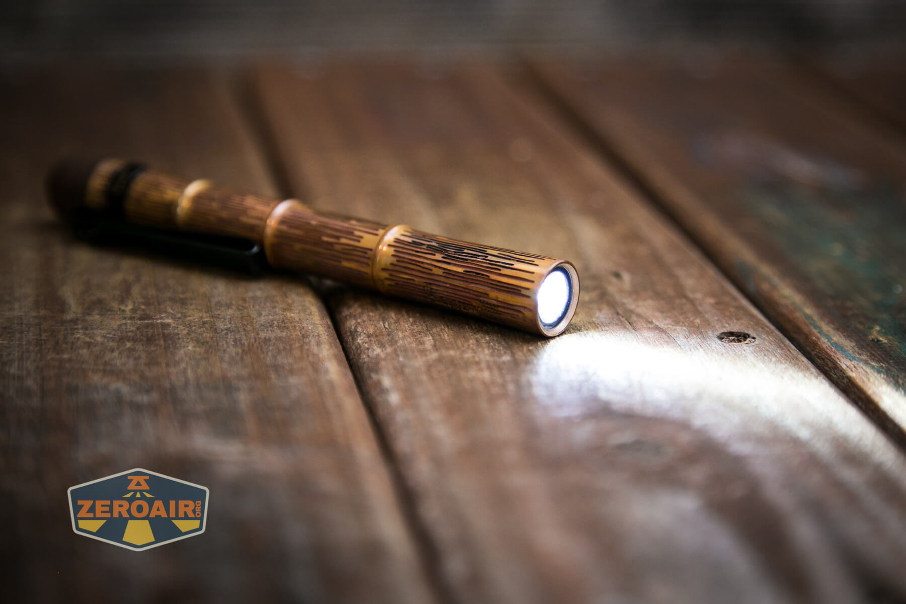 Olight i3T Plus Ancient Bamboo flashlight emitter and TIR