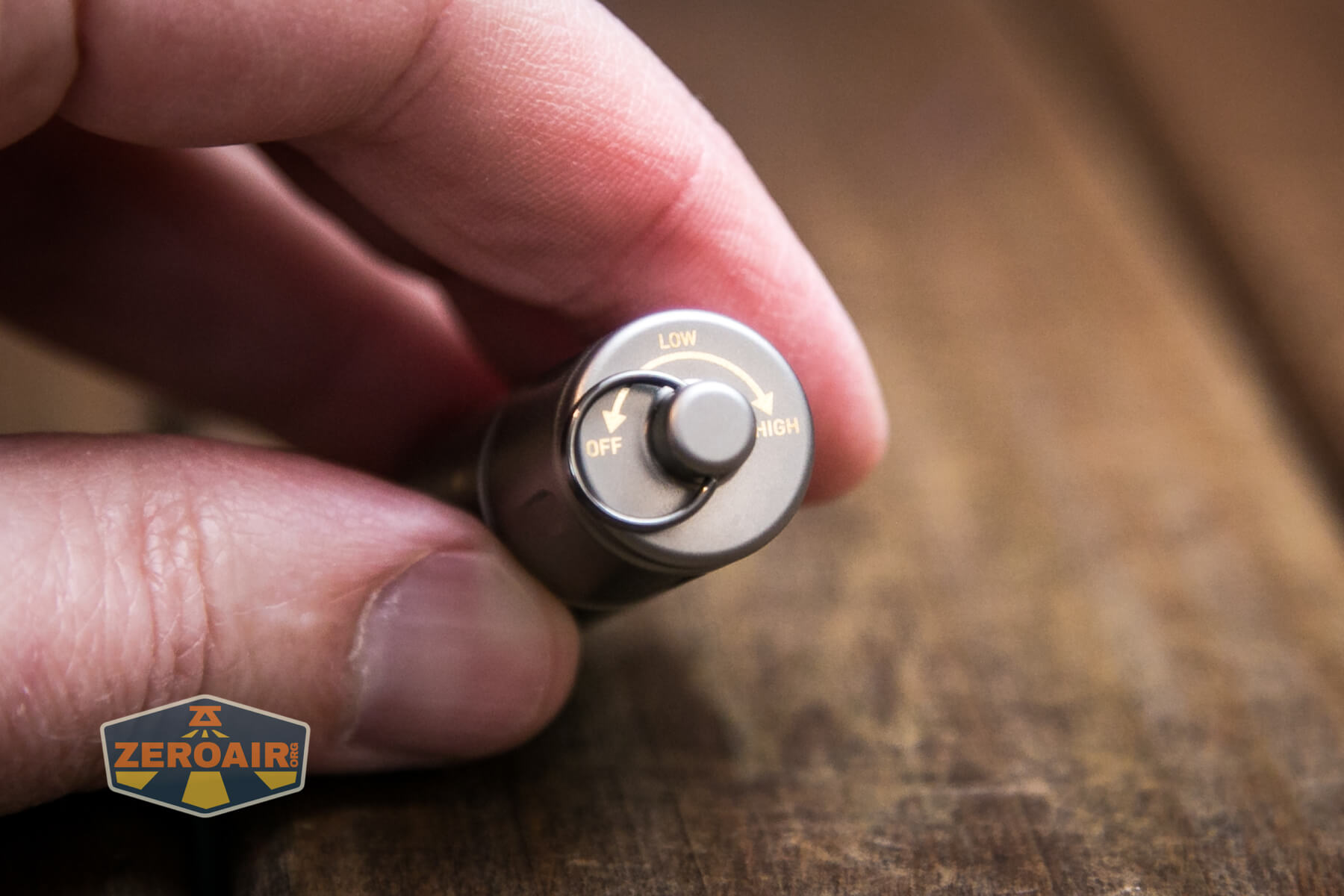 Olight iXV Ti keychain flashlight user interface printing