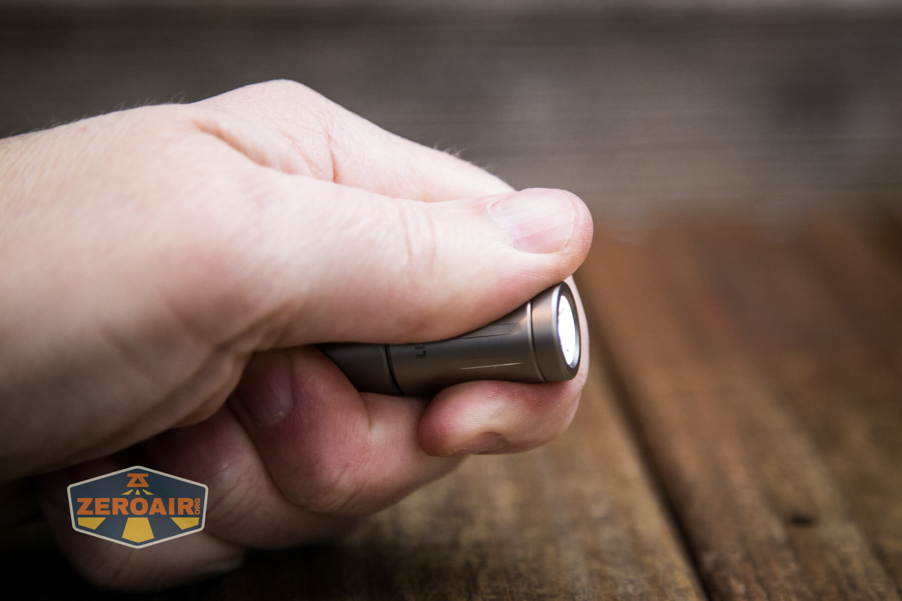 Olight iXV Ti keychain flashlight is a twisty