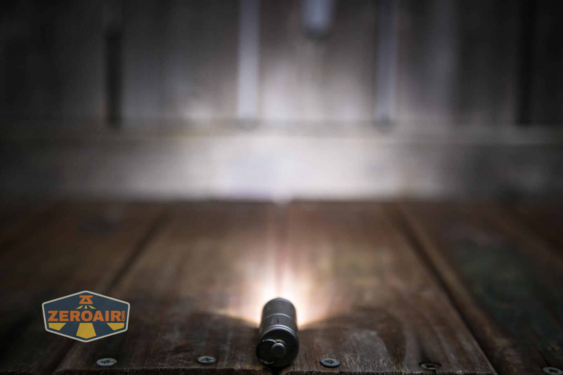 Olight iXV Ti keychain flashlight emitter on
