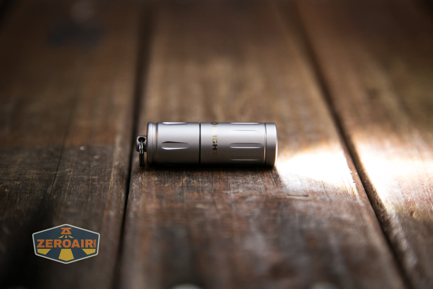 Olight iXV Ti keychain flashlight emitter on