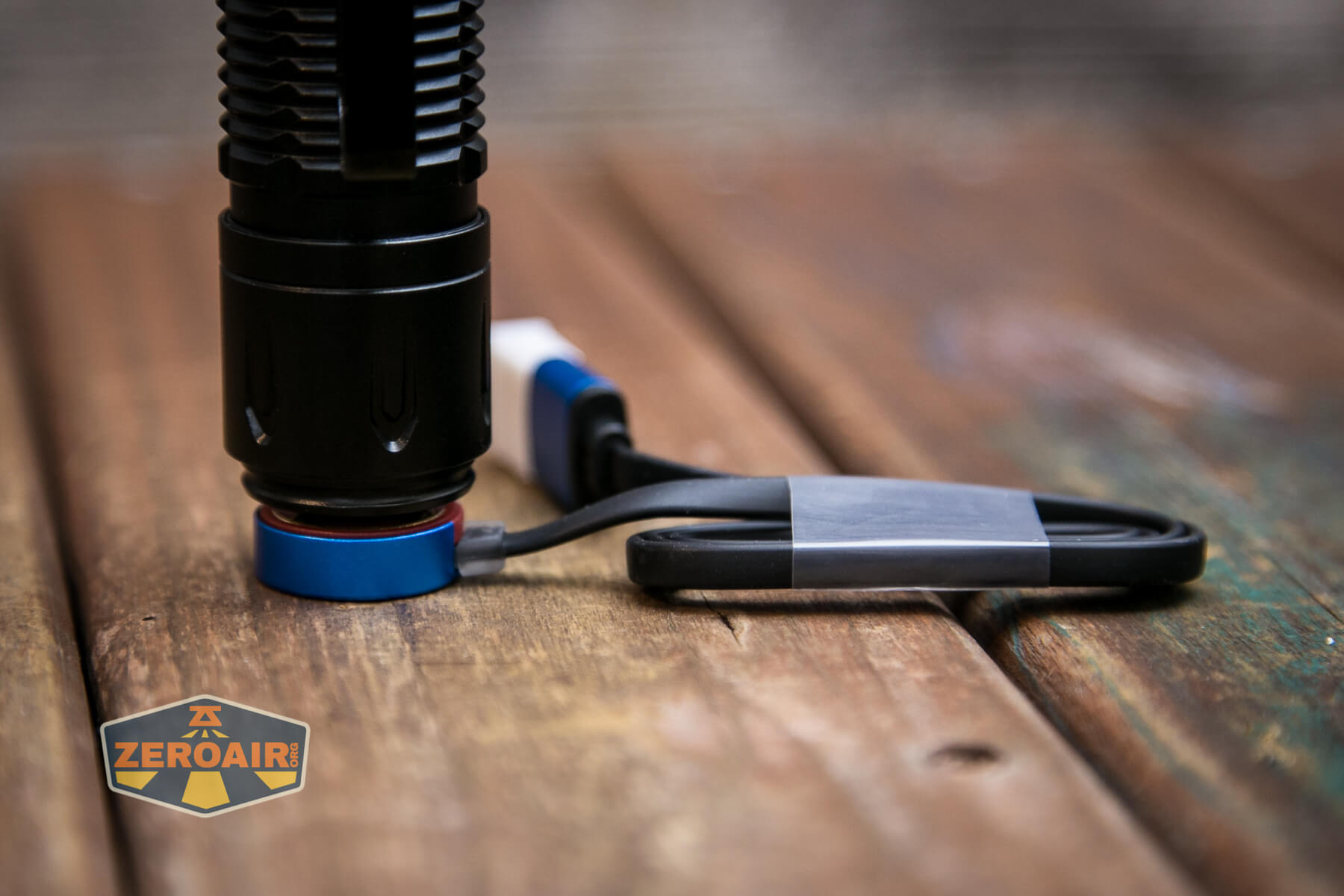 Olight warrior 3S flashlight on mcc charger