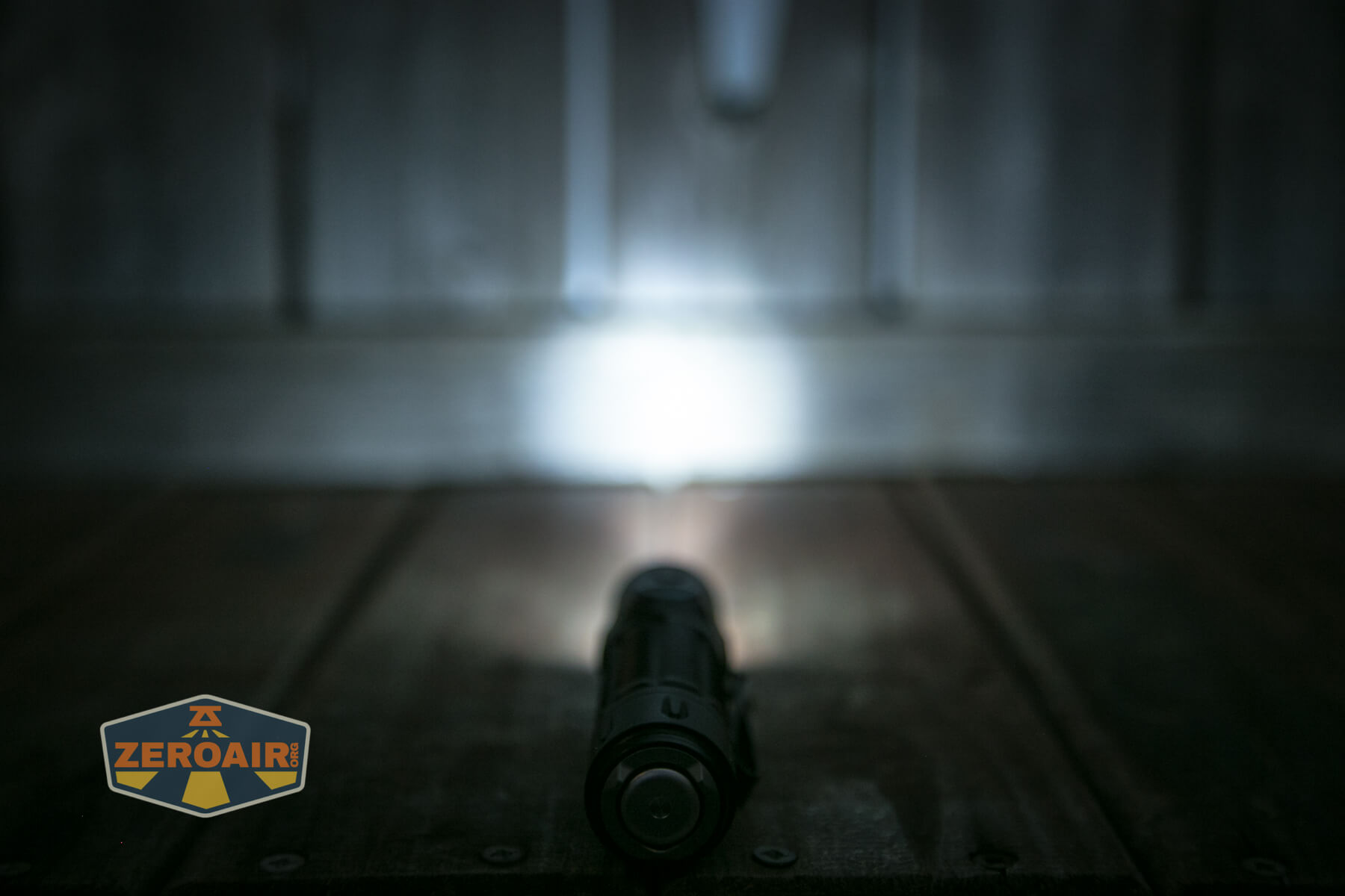 Olight warrior 3S flashlight emitter on