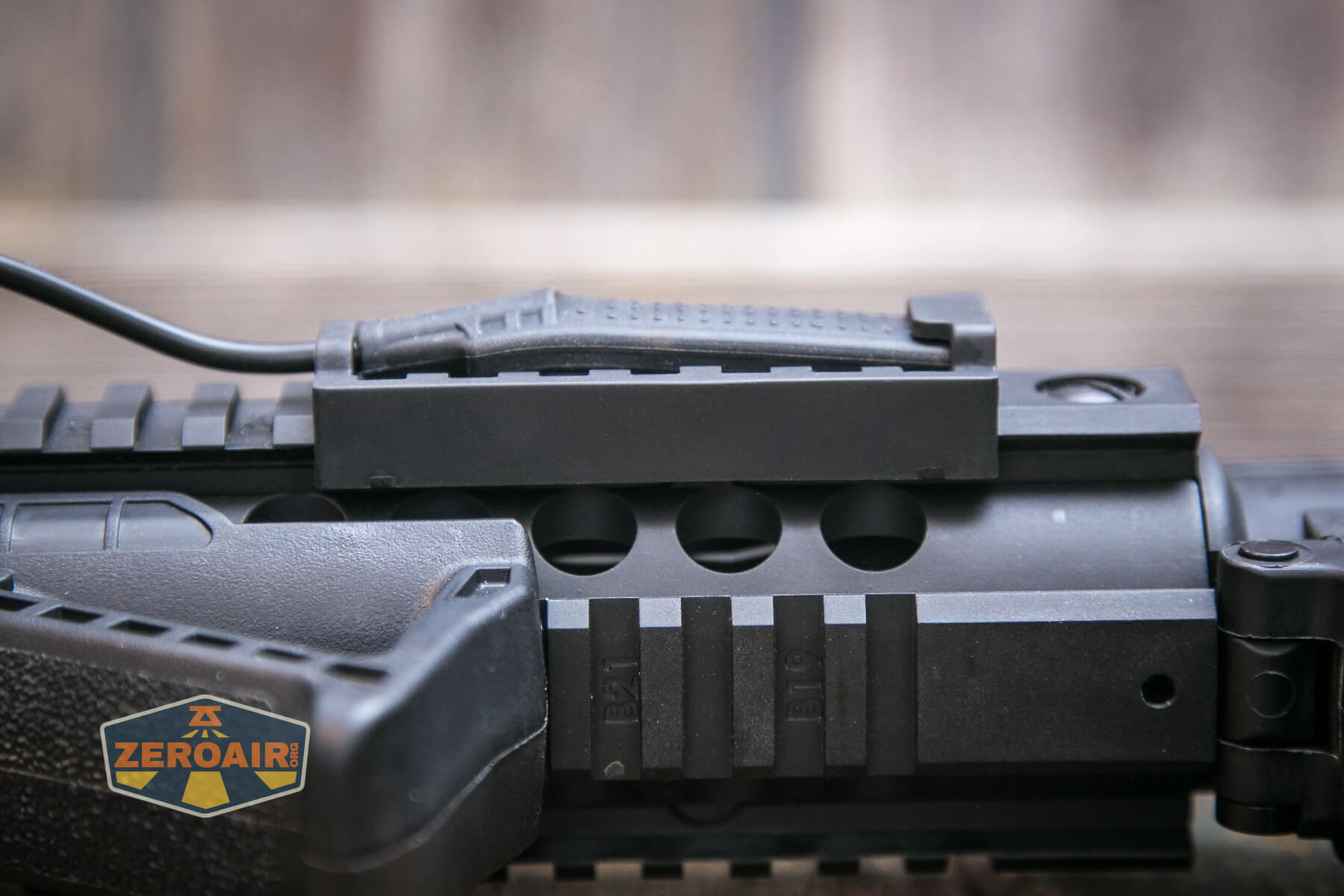 Thrunite TW20 flashlight mounted on rails