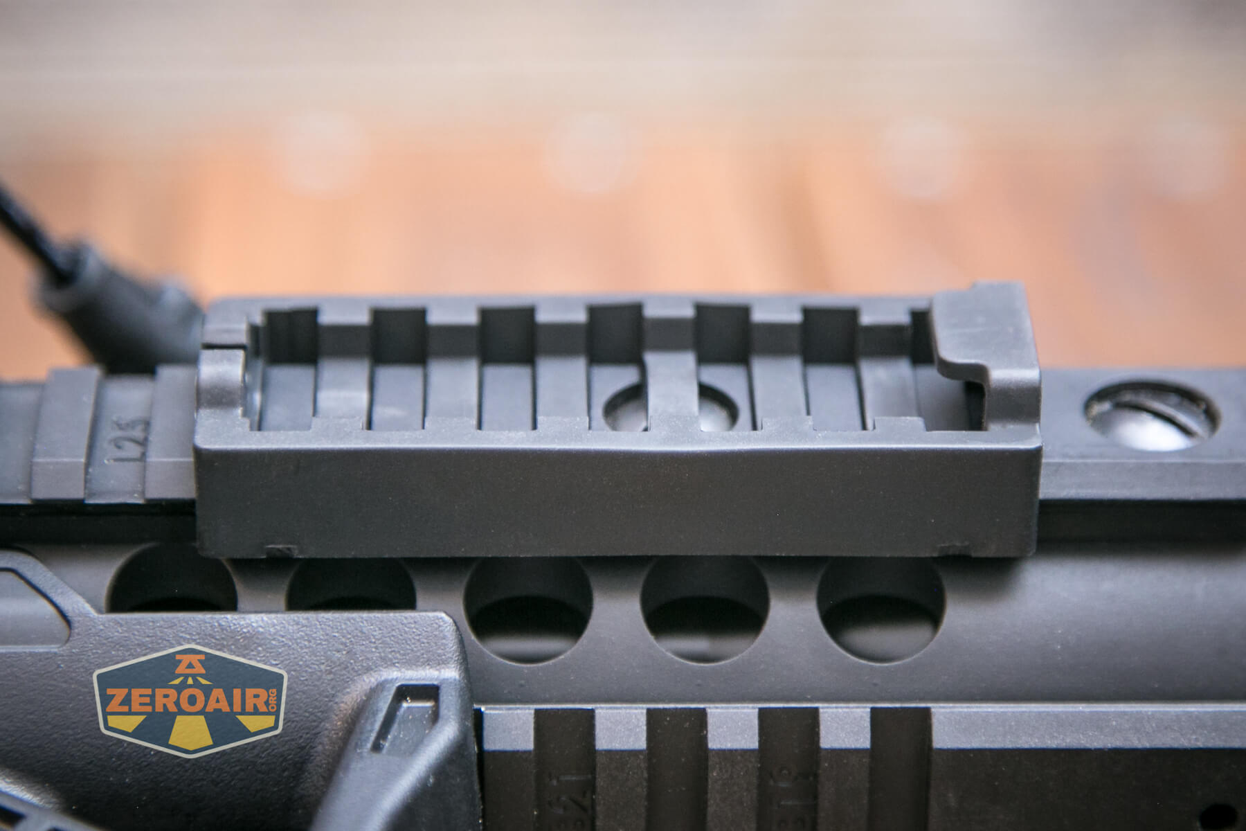 Thrunite TW20 flashlight mounted on rails