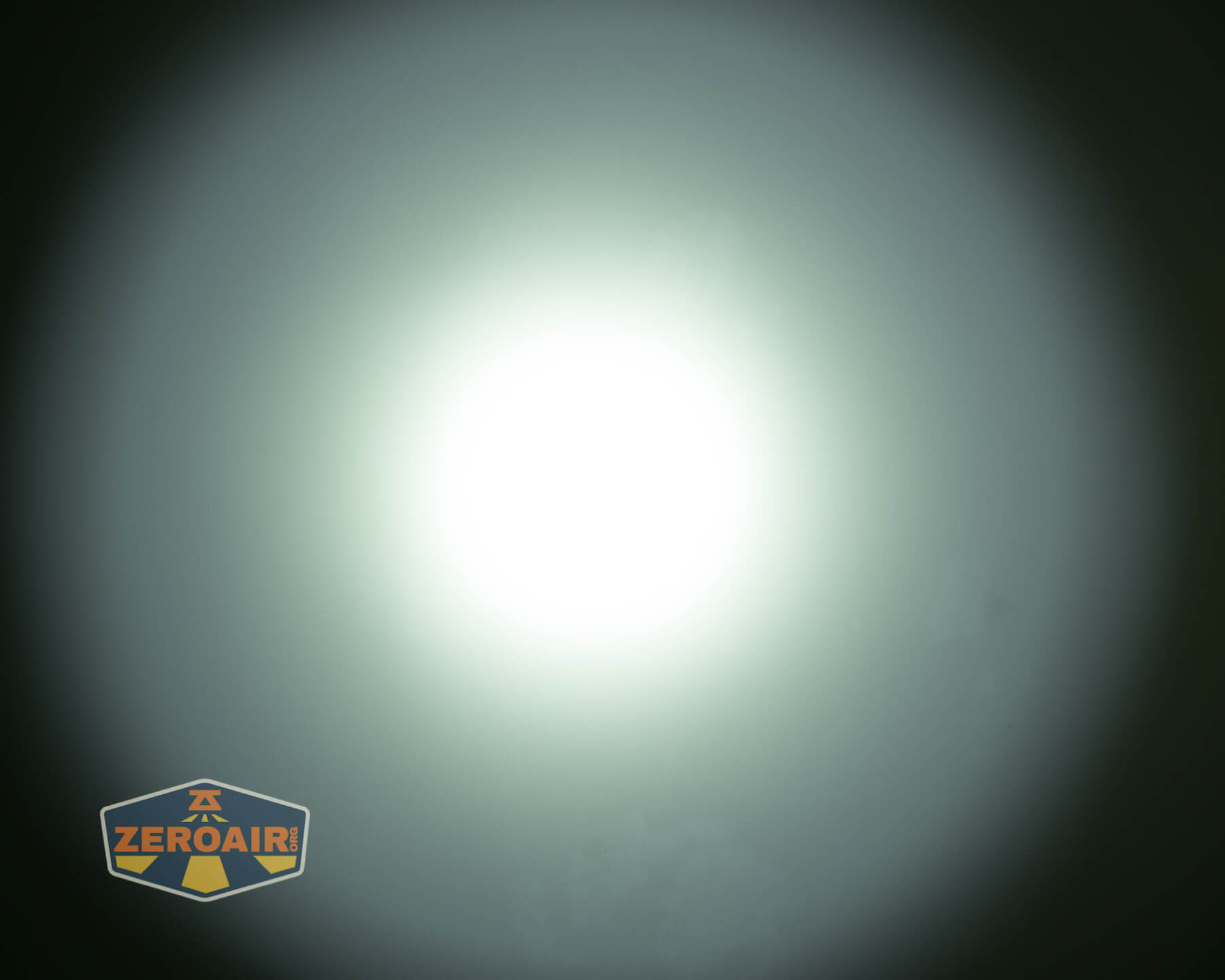 Thrunite TW20 flashlight beamshots on ceiling