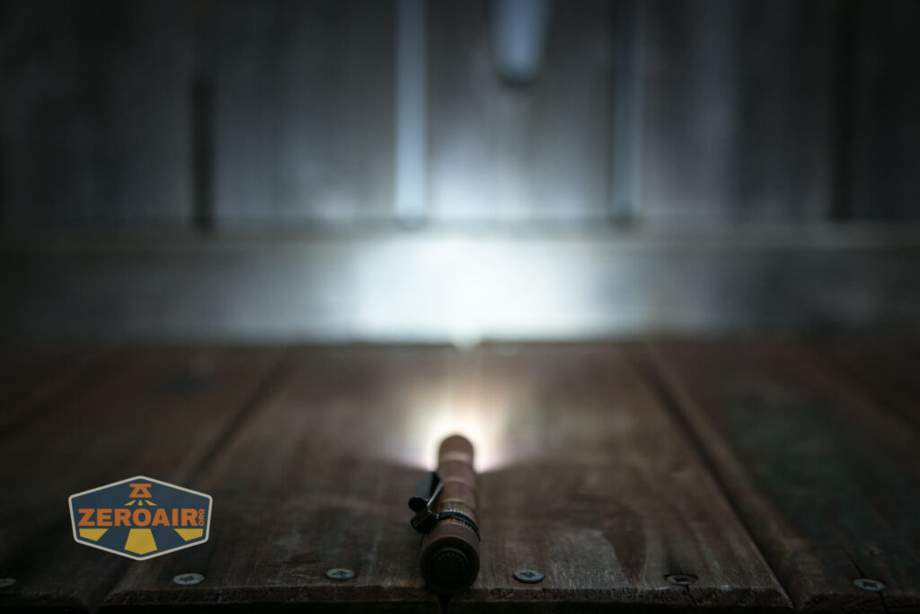 Olight i3T Plus Ancient Bamboo flashlight emitter on