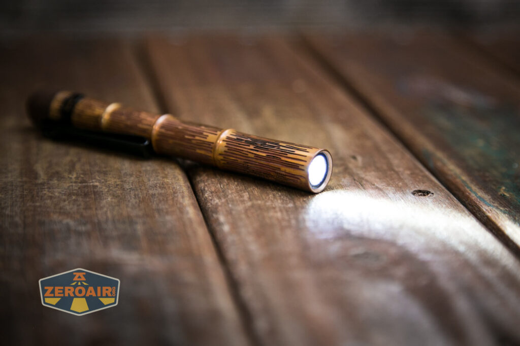 Olight i3T Plus Ancient Bamboo flashlight emitter and TIR