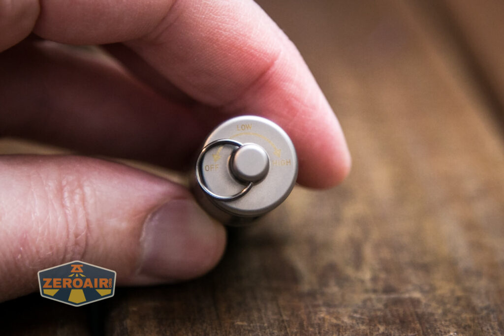 Olight iXV Ti keychain flashlight user interface printing