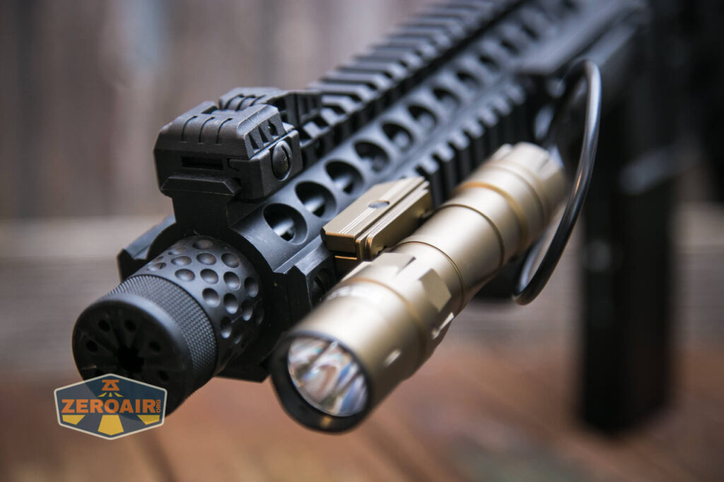 Thrunite TW20 flashlight mounted on rails