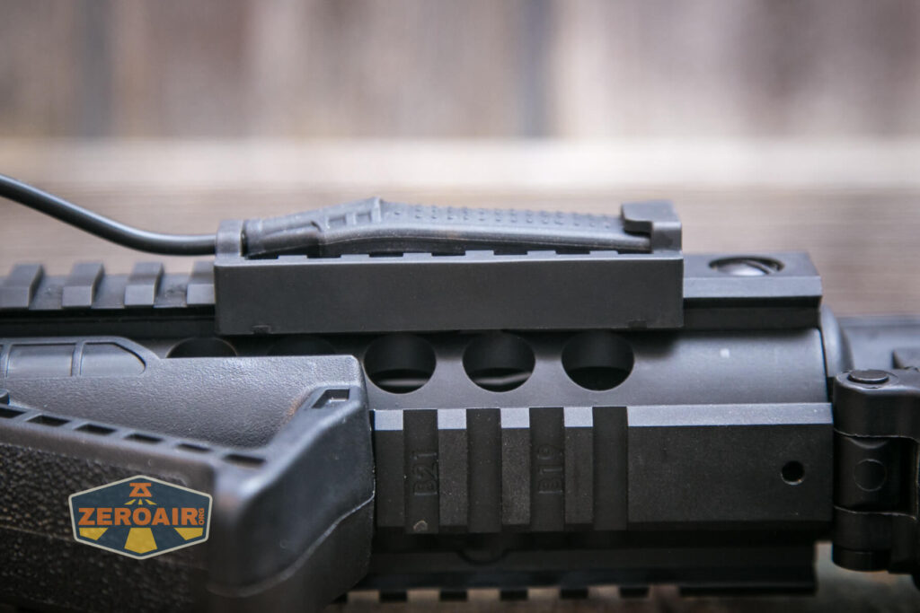 Thrunite TW20 flashlight mounted on rails